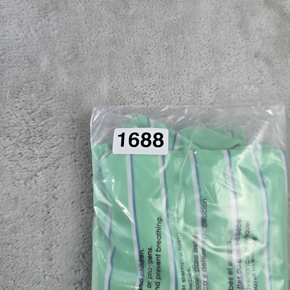 Under Armour Golf Men's XL Polo Shirt Loose Green Striped - Picture 7 of 7